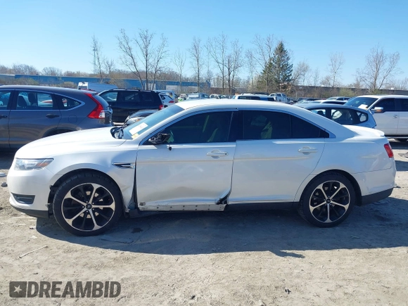 2014 Ford Taurus SEL z VIN 1FAHP2E81EG104137, wystawiony jako IAAI lot #42054432 z przebiegiem 146 046 mil mil oraz . Historia ofert i sprzedaży dostępna na DreamBid. Obrazek 14.