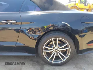 2017 Ford Mustang EcoBoost Premium z VIN 1FATP8UH8H5331324, wystawiony jako IAAI lot #42754503 z przebiegiem 84 209 mil mil oraz . Historia ofert i sprzedaży dostępna na DreamBid. Obrazek 17.