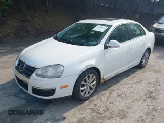 2009 Volkswagen Jetta S z VIN 3VWHM71KX9M134604, wystawiony jako IAAI lot #42468306 z przebiegiem 109 509 mil mil oraz . Historia ofert i sprzedaży dostępna na DreamBid. Obrazek 2.