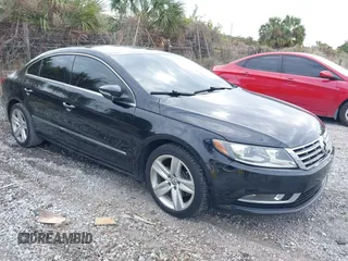 2014 Volkswagen CC Sport with VIN WVWBP7AN0EE526002, listed as a IAAI auction lot 41327900 with 162,328 mi miles and . Bid and sale history available at DreamBid. Image 1.