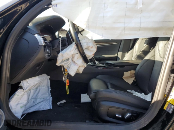 2020 BMW 5 Series 530e with VIN WBAJA9C05LCD74527, listed as a Copart auction lot 47013875 with Not Provided miles and Salvage Title. Bid and sale history available at DreamBid. Image 7.