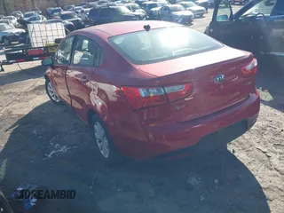 2014 Kia Rio EX z VIN KNADN4A35E6355797, wystawiony jako IAAI lot #41639623 z przebiegiem 152 057 mil mil oraz . Historia ofert i sprzedaży dostępna na DreamBid. Obrazek 3.