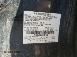2015 Ford Flex SEL with VIN 2FMHK6C85FBA21138, listed as a Copart auction lot 50011725 with 115,897 mi miles and Salvage Title. Bid and sale history available at carsss.com. Image 13.