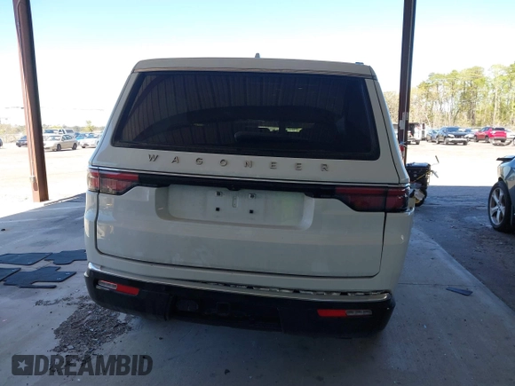 2023 Jeep Grand Wagoneer with VIN 1C4SJUAT5PS509425, listed as a IAAI auction lot 41765704 with 65,656 mi miles and . Bid and sale history available at DreamBid. Image 16.
