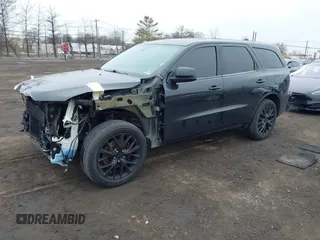 2015 Dodge Durango R/T with VIN 1C4SDJCT8FC188055, listed as a IAAI auction lot 41824301 with 109,059 mi miles and . Bid and sale history available at carsss.com. Image 2.