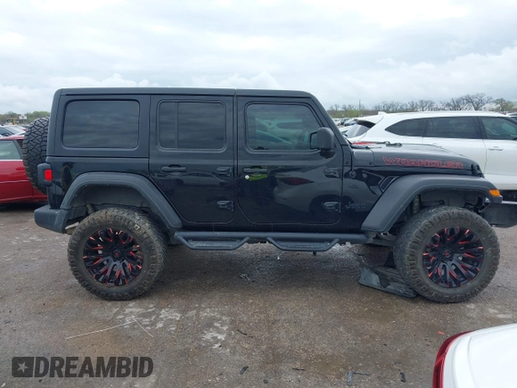 2022 Jeep Wrangler Unlimited Sport S z VIN 1C4HJXDG0NW133801, wystawiony jako IAAI lot #41908846 z przebiegiem 44 743 mil mil oraz . Historia ofert i sprzedaży dostępna na DreamBid. Obrazek 13.