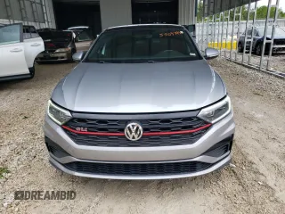 2019 Volkswagen Jetta GLI S z VIN 3VW6T7BU4KM222404, wystawiony jako Copart lot #55097435 z przebiegiem 121 664 mil mil oraz Szkoda całkowita • Salvage title. Historia ofert i sprzedaży dostępna na DreamBid. Obrazek 5.