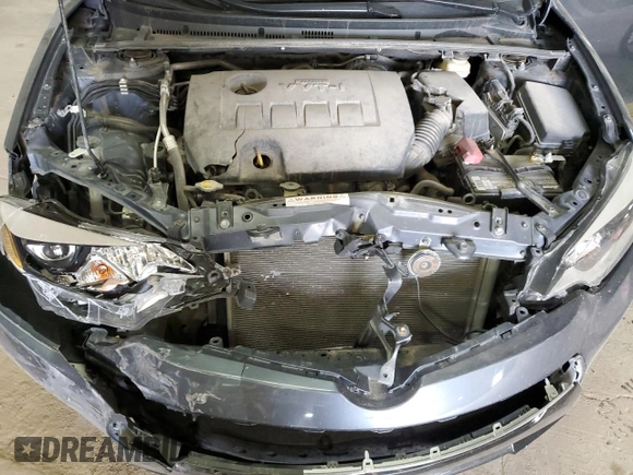 2016 Toyota Corolla L z VIN 5YFBURHE6GP411923, wystawiony jako Copart lot #52326335 z przebiegiem 92 981 mil mil oraz Szkoda całkowita • Salvage title. Historia ofert i sprzedaży dostępna na DreamBid. Obrazek 11.