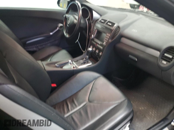2005 Mercedes-Benz SLK-Class with VIN WDBWK56FX5F049285, listed as a Copart auction lot 73306494 with 94,785 mi miles and Salvage Title. Bid and sale history available at carsss.com. Image 10.