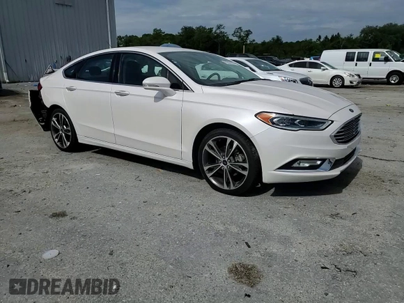 2017 Ford Fusion Titanium с VIN 3FA6P0K96HR161679, выставлен на аукционе Copart как лот 61237935 с пробегом 66 680 миль миль и Списание • Salvage title. История ставок и продаж доступна на DreamBid. Изображение 13.