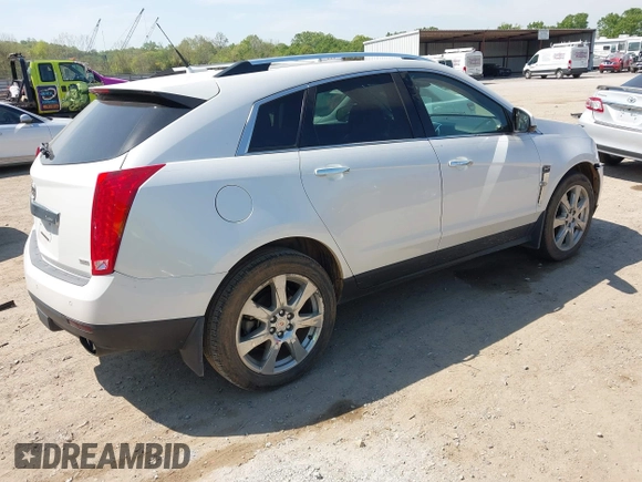 2012 Cadillac SRX Performance Collection z VIN 3GYFNBE39CS628740, wystawiony jako IAAI lot #42063414 z przebiegiem 88 260 mil mil oraz . Historia ofert i sprzedaży dostępna na DreamBid. Obrazek 4.