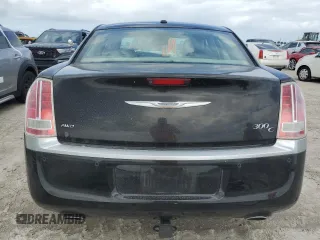 2013 Chrysler 300 Luxury Series with VIN 2C3CCASG7DH534199, listed as a Copart auction lot 75991324 with Not Provided miles and Salvage Title. Bid and sale history available at DreamBid. Image 6.