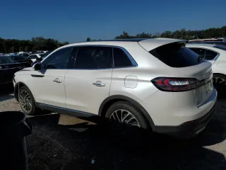 2019 Lincoln Nautilus Reserve with VIN 2LMPJ6LPXKBL21200, listed as a Copart auction lot 85203634 with 60,728 mi miles and Salvage Title. Bid and sale history available at carsss.com. Image 2.