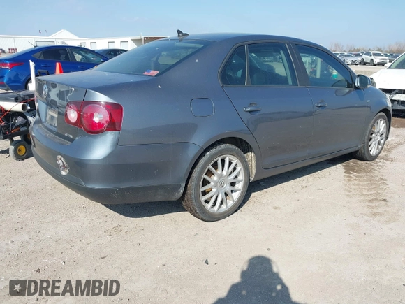 2008 Volkswagen Jetta Wolfsburg Edition with VIN 3VWRJ71K98M196183, listed as a IAAI auction lot 41512701 with 95,231 mi miles and . Bid and sale history available at DreamBid. Image 4.