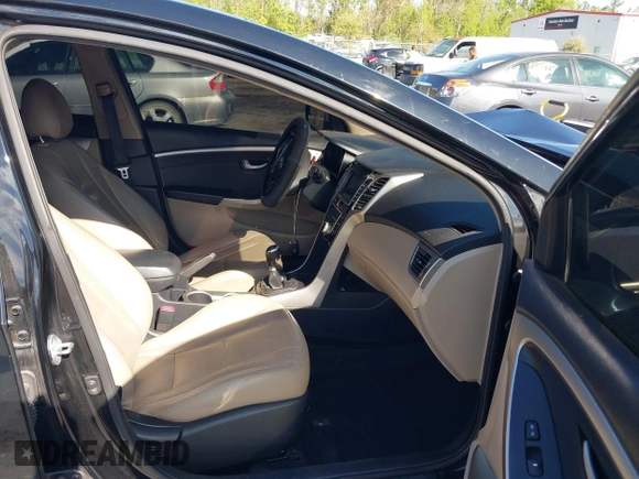 2014 Hyundai Elantra GT with VIN KMHD35LH5EU171569, listed as a IAAI auction lot 41882896 with 181,989 mi miles. Bid and sale history available at carsss.com. Image 5.
