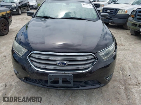 2014 Ford Taurus SE z VIN 1FAHP2D81EG140072, wystawiony jako IAAI lot #42124900 z przebiegiem 116 560 mil mil oraz . Historia ofert i sprzedaży dostępna na DreamBid. Obrazek 6.