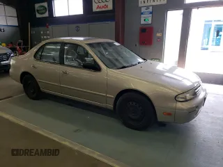1996 Nissan Altima XE z VIN 1N4BU31D0TC137724, wystawiony jako Copart lot #71544394 z przebiegiem 122 704 mil mil oraz Czysty tytuł • Clean title. Historia ofert i sprzedaży dostępna na DreamBid. Obrazek 4.