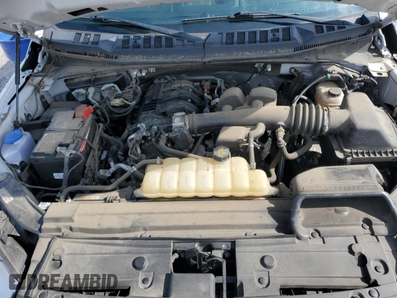 2020 Ford F-150 XL with VIN 1FTEW1EB7LFB37927, listed as a Copart auction lot 58146935 with 70,273 mi miles and Salvage title. Bid and sale history available at DreamBid. Image 11.