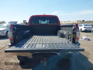 2014 Toyota Tacoma with VIN 5TFUU4EN7EX084785, listed as a IAAI auction lot 41879329 with 133,216 mi miles and . Bid and sale history available at DreamBid. Image 16.