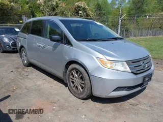 2011 Honda Odyssey EX-L with VIN 5FNRL5H62BB075789, listed as a IAAI auction lot 42035746 with 238,616 mi miles and . Bid and sale history available at carsss.com. Image 1.