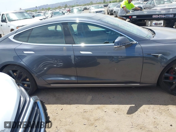 2018 Tesla Model S 75D with VIN 5YJSA1E43JF260547, listed as a IAAI auction lot 42346240 with 89,637 mi miles and . Bid and sale history available at DreamBid. Image 12.