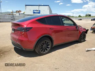2024 Tesla Model Y Long Range z VIN 7SAYGDEE6RF156183, wystawiony jako Copart lot #61410155 z przebiegiem 27 112 mil mil oraz Szkoda całkowita • Salvage title. Historia ofert i sprzedaży dostępna na DreamBid. Obrazek 3.