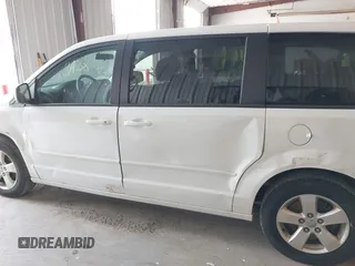 2017 Dodge Grand Caravan SE with VIN 2C4RDGBG4HR736309, listed as a IAAI auction lot 41993938 with 105,213 mi miles and . Bid and sale history available at DreamBid. Image 14.