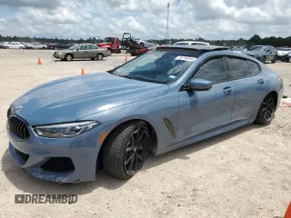 2022 BMW 8 Series M850i with VIN WBAGV8C06NCH82353, listed as a Copart auction lot 59734554 with 0 mi miles and Salvage Title. Bid and sale history available at carsss.com. Image 1.