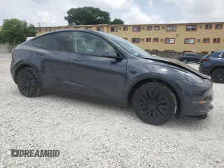 2024 Tesla Model Y Long Range с VIN 7SAYGDEE7RA279293, выставлен на аукционе Copart как лот 62758065 с пробегом 23 271 миль миль и Списание • Salvage title. История ставок и продаж доступна на DreamBid. Изображение 4.