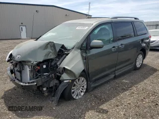 2014 Toyota Sienna XLE with VIN 5TDYK3DCXES406696, listed as a Copart auction lot 54356865 with 66,745 mi miles and Salvage title. Bid and sale history available at DreamBid. Image 1.