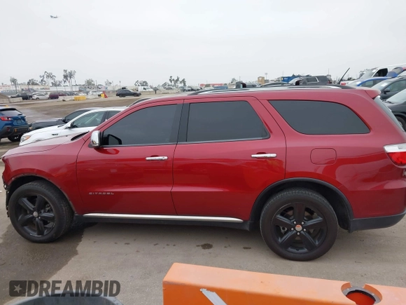 2013 Dodge Durango Citadel with VIN 1C4RDJEGXDC669937, listed as a IAAI auction lot 42105204 with 153,015 mi miles and . Bid and sale history available at DreamBid. Image 14.