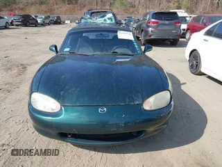 1999 Mazda MX-5 Miata with VIN JM1NB3537X0109618, listed as a IAAI auction lot 41795736 with 160,452 mi miles and . Bid and sale history available at DreamBid. Image 13.
