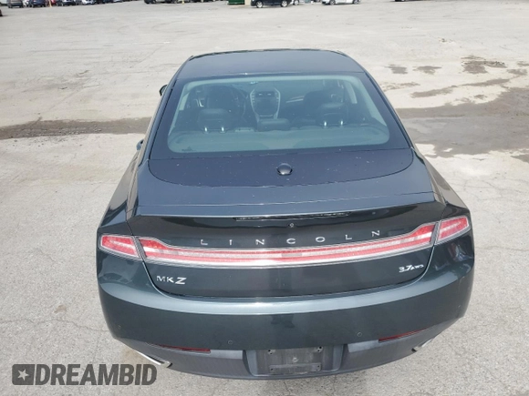 2015 Lincoln MKZ с VIN 3LN6L2JK6FR616660, выставлен на аукционе Copart как лот 66220555 с пробегом 47 377 миль миль и Списание • Salvage title. История ставок и продаж доступна на DreamBid. Изображение 6.