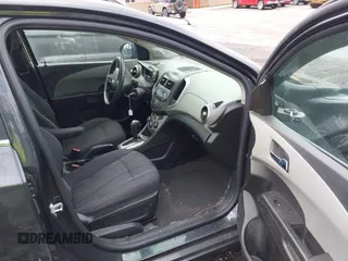 2014 Chevrolet Sonic LT with VIN 1G1JC5SH5E4202854, listed as a IAAI auction lot 42049844 with 150,705 mi miles and . Bid and sale history available at DreamBid. Image 5.
