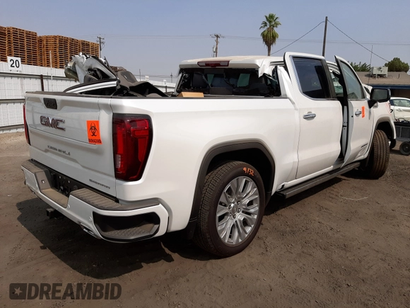 2021 GMC Sierra 1500 Denali z VIN 3GTU9FET8MG378713, wystawiony jako Copart lot #57685721 z przebiegiem Nie podano mil oraz Szkoda całkowita • Salvage title. Historia ofert i sprzedaży dostępna na DreamBid. Obrazek 4.