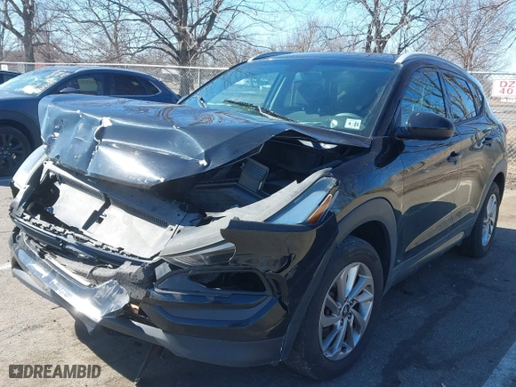 2016 Hyundai Tucson SE with VIN KM8J3CA41GU133962, listed as a IAAI auction lot 41634282 with 101,705 mi miles. Bid and sale history available at carsss.com. Image 17.