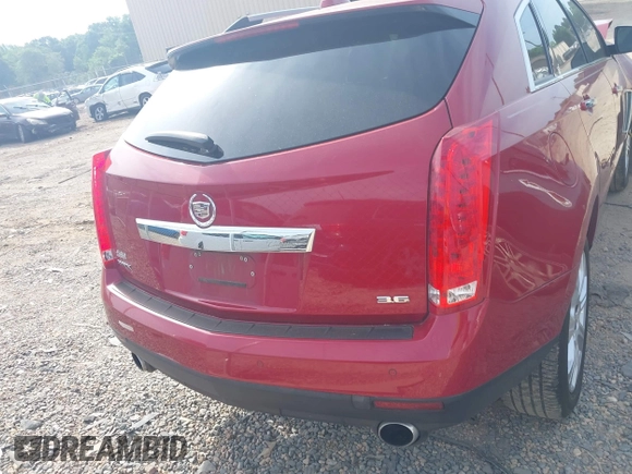 2015 Cadillac SRX Performance Collection z VIN 3GYFNCE37FS567267, wystawiony jako IAAI lot #42160129 z przebiegiem 144 948 mil mil oraz . Historia ofert i sprzedaży dostępna na DreamBid. Obrazek 17.