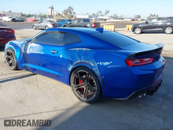 2018 Chevrolet Camaro 1SS with VIN 1G1FE1R78J0131642, listed as a IAAI auction lot 41970560 with 34,140 mi miles and . Bid and sale history available at DreamBid. Image 3.