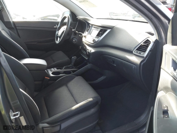 2017 Hyundai Tucson SE Plus with VIN KM8J33A40HU329666, listed as a IAAI auction lot 42084886 with 144,785 mi miles. Bid and sale history available at carsss.com. Image 5.