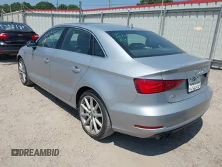 2016 Audi A3 Premium Plus z VIN WAUC7GFF3G1007880, wystawiony jako IAAI lot #42045421 z przebiegiem 69 377 mil mil oraz . Historia ofert i sprzedaży dostępna na DreamBid. Obrazek 3.