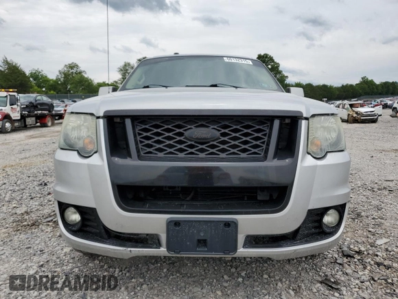 2010 Ford Explorer Sport Trac with VIN 1FMEU2D86AUA04257, listed as a Copart auction lot 60132315 with 116,941 mi miles and Salvage title. Bid and sale history available at DreamBid. Image 5.
