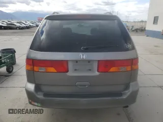 2002 Honda Odyssey EX z VIN 5FNRL18652B014929, wystawiony jako Copart lot #57185775 z przebiegiem 291 807 mil mil oraz Czysty tytuł • Clean title. Historia ofert i sprzedaży dostępna na DreamBid. Obrazek 6.