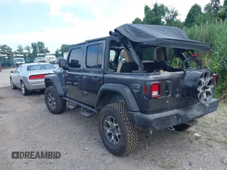 2020 Jeep Wrangler Unlimited Sport S with VIN 1C4HJXDN7LW113735, listed as a IAAI auction lot 42639884 with 48,736 mi miles and . Bid and sale history available at DreamBid. Image 3.