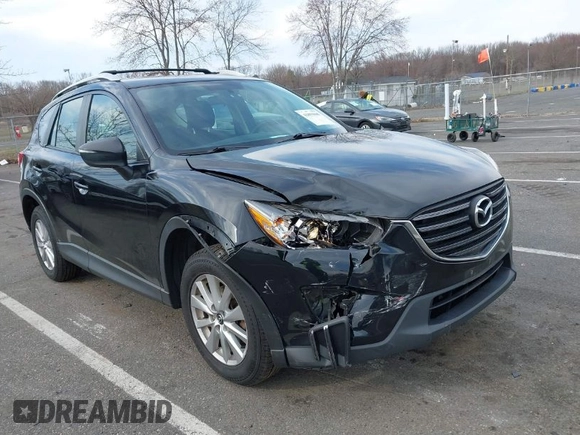 2016 Mazda CX-5 Sport with VIN JM3KE4BY7G0893578, listed as a IAAI auction lot 41853840 with 95,937 mi miles. Bid and sale history available at carsss.com. Image 1.