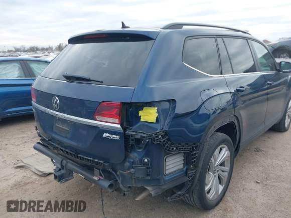 2021 Volkswagen Atlas SE z VIN 1V2JR2CA3MC555490, wystawiony jako IAAI lot #41286240 z przebiegiem 89 435 mil mil oraz . Historia ofert i sprzedaży dostępna na DreamBid. Obrazek 6.