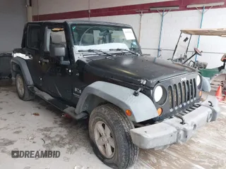2007 Jeep Wrangler Unlimited X with VIN 1J4GA391X7L209435, listed as a IAAI auction lot 41813504 with 213,334 mi miles and . Bid and sale history available at DreamBid. Image 1.