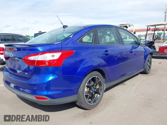 2013 Ford Focus SE with VIN 1FADP3F27DL138703, listed as a IAAI auction lot 41797537 with 128,070 mi miles. Bid and sale history available at carsss.com. Image 4.