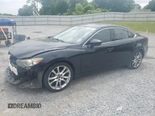 2014 Mazda 6 i Grand Touring с VIN JM1GJ1W50E1110102, выставлен на аукционе Copart как лот 57478275 с пробегом 194 616 миль миль и Списание • Salvage title. История ставок и продаж доступна на DreamBid. Изображение 1.