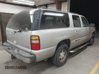 2004 GMC Yukon XL SLE with VIN 3GKEC16T14G149236, listed as a IAAI auction lot 41550083 with 165,759 mi miles. Bid and sale history available at carsss.com. Image 4.