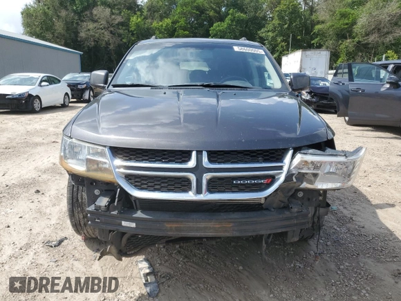 2017 Dodge Journey SXT with VIN 3C4PDDBG9HT639285, listed as a Copart auction lot 58600005 with 124,887 mi miles and Salvage title. Bid and sale history available at DreamBid. Image 5.